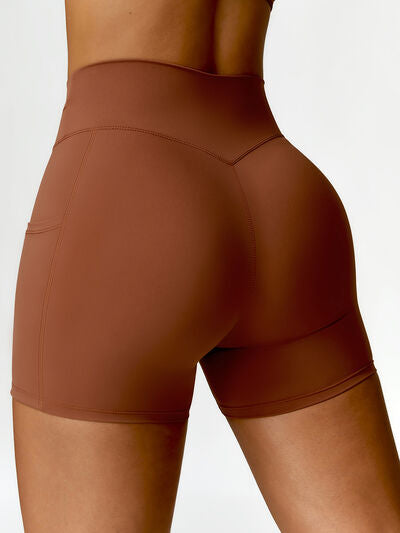 TWISTED HIGH WAIST ACTIVE SHORTS WITH POCKETS