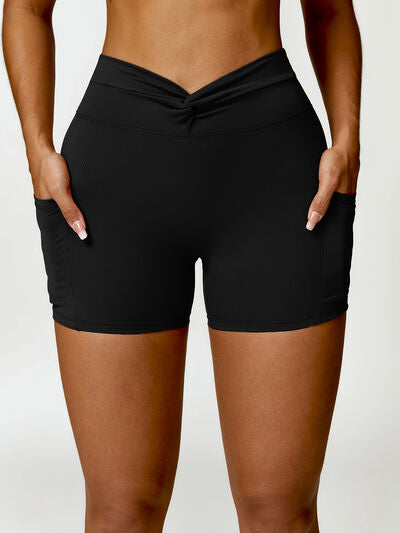 TWISTED HIGH WAIST ACTIVE SHORTS WITH POCKETS