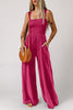 SMOCKED SQUARE NECK WIDE LEG JUMPSUIT WITH POCKETS