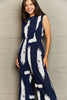 PRINTED ROUND NECK CUTOUT JUMPSUIT WITH POCKETS